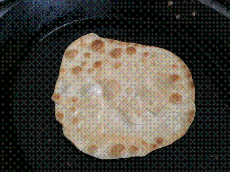 A parotta style fltabread, fried in foamy butter